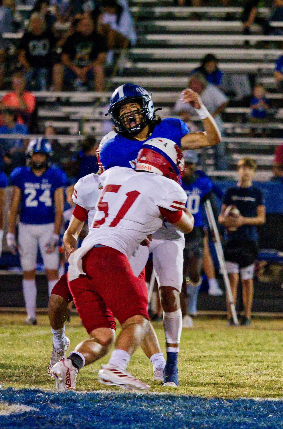 Jason Langston applies pressure to the Wolfe City quarterback shortly after the pass was away. [find more football photos]